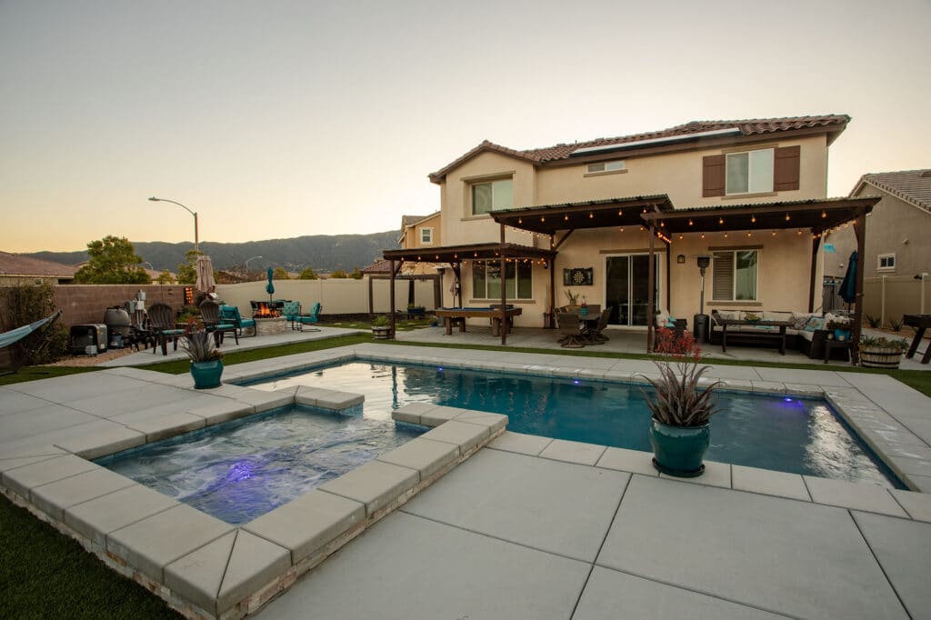 Swimming pool with a hot tub